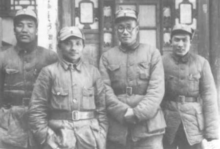 In January 1938, Deng was appointed Director of the Political Training Department of the 129th Division of the Eighth Route Army. This photo shows the leaders of the 129th Division in Tongyu Town, Liaoxian (now Zuoquan County), Shanxi. From left to right: Li Da, Deng, Liu Bocheng, and Cai Shufan.